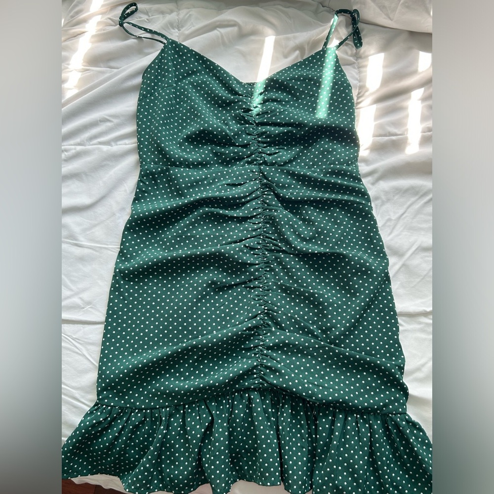 green polka dot mini dress